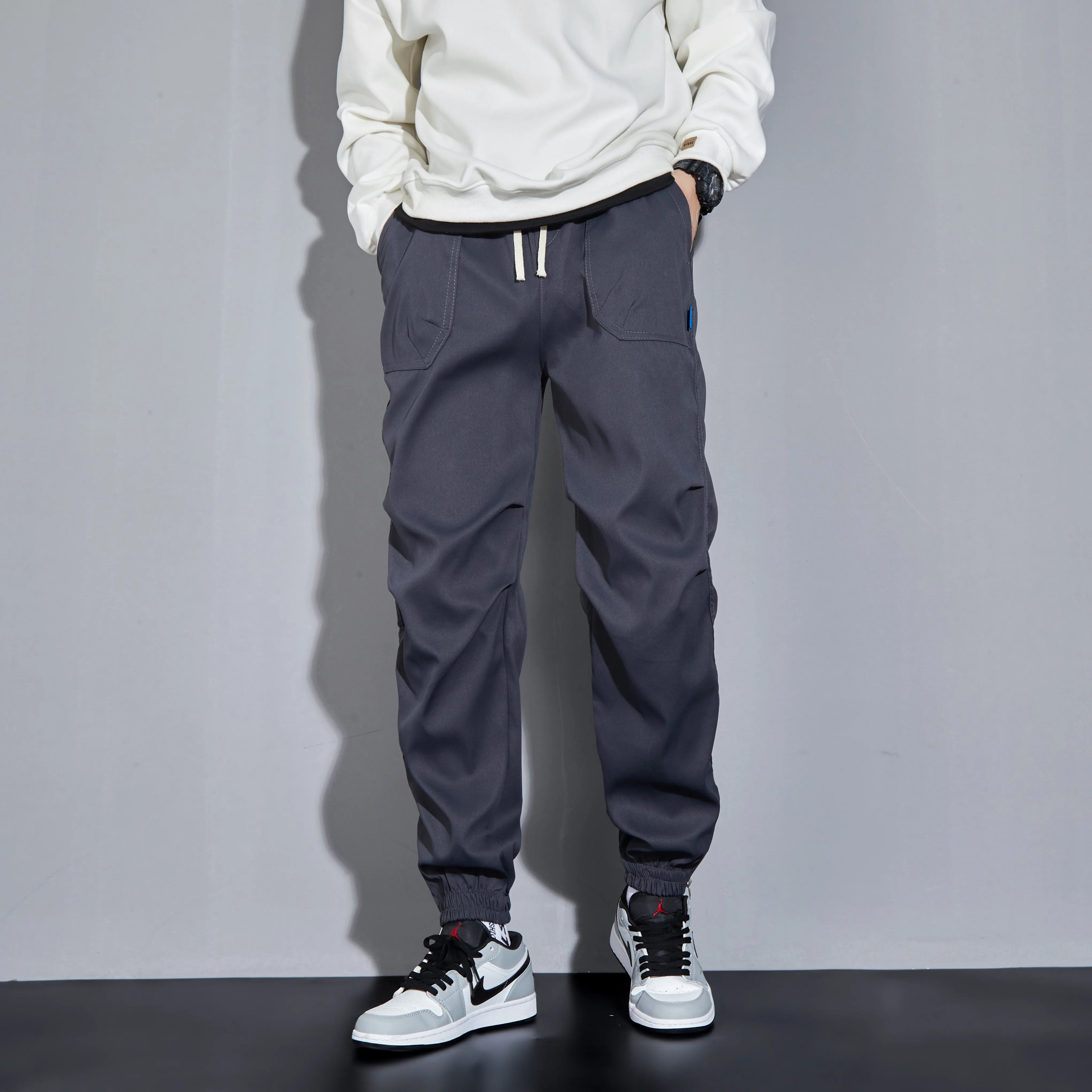 Trendy Solid Cargo Pants Men Flap Pocket Side Drawstring Waist Cargo Pants Fashion Hip-hop Sports Loose Nine-minute Pants