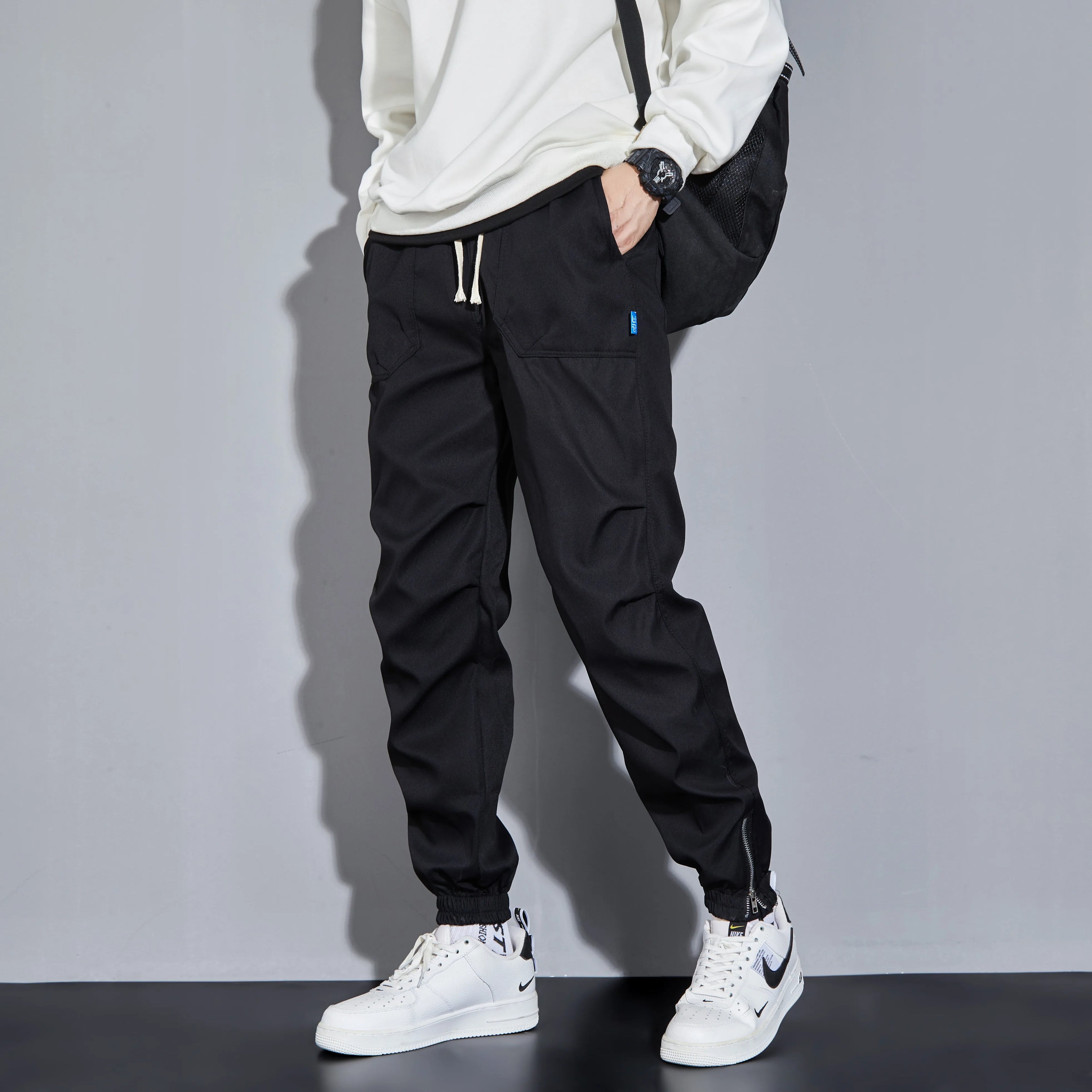 Trendy Solid Cargo Pants Men Flap Pocket Side Drawstring Waist Cargo Pants Fashion Hip-hop Sports Loose Nine-minute Pants