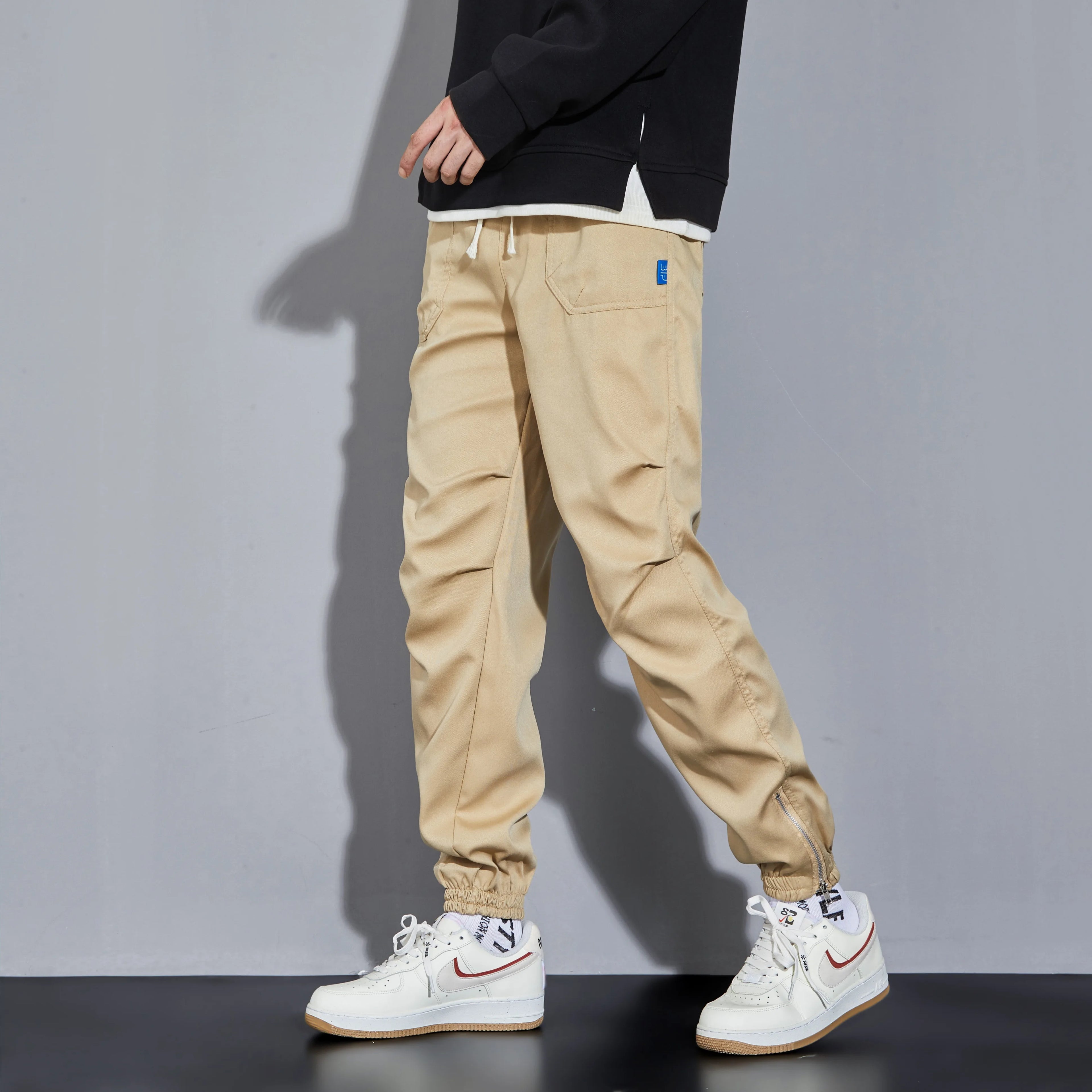 Trendy Solid Cargo Pants Men Flap Pocket Side Drawstring Waist Cargo Pants Fashion Hip-hop Sports Loose Nine-minute Pants
